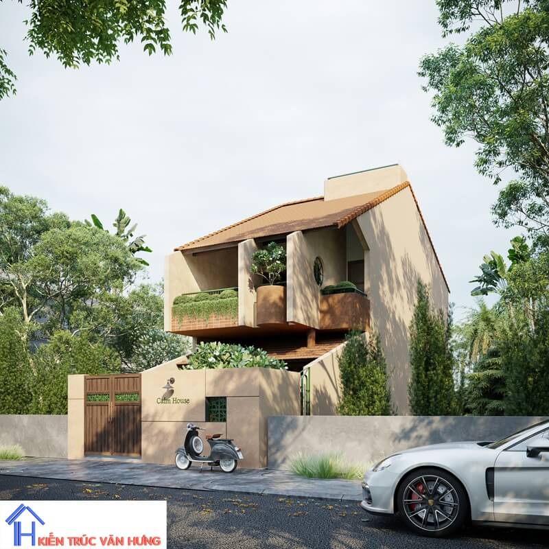 Ngôi nhà mang phong cách mộc mạc với tông màu đất ấm và ban công xanh