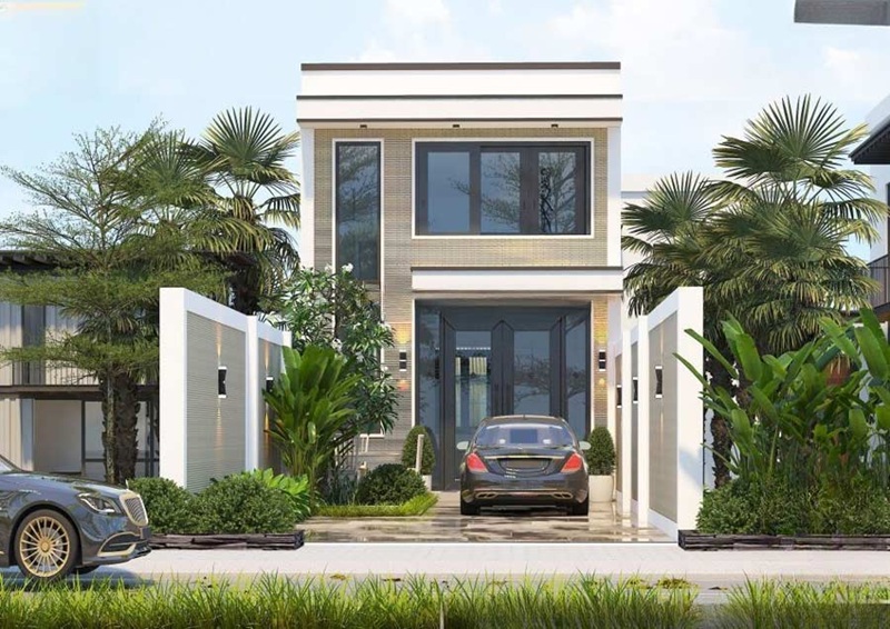 Nhà phố hiện đại có hệ thống chiếu sáng mặt tiền tinh tế và khoảng sân vườn nhỏ