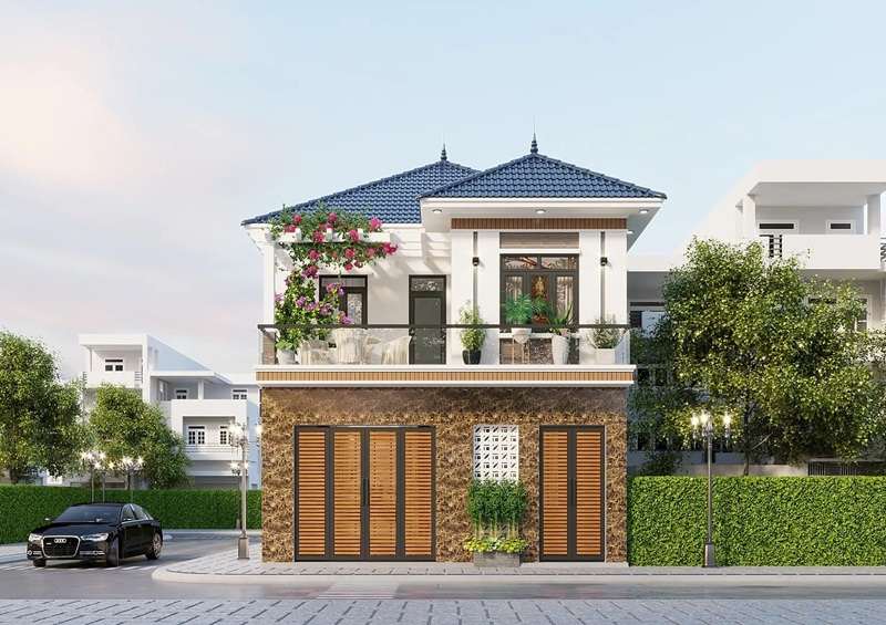 Mẫu nhà phố 2 tầng mái Thái, tầng trệt được ốp đá hoa cương sang trọng