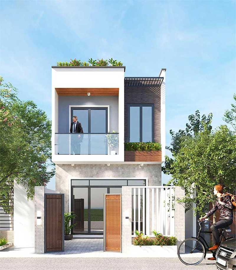 Thiết kế nhà 2 tầng hiện đại với không gian ban công và chậu cây xanh phía trước