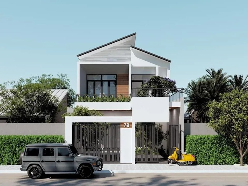 Mẫu nhà mái lệch 2 tầng hiện đại kết hợp cây xanh trước mặt tiền